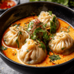 Soup Dumplings in Thai Red Curry Sauce
