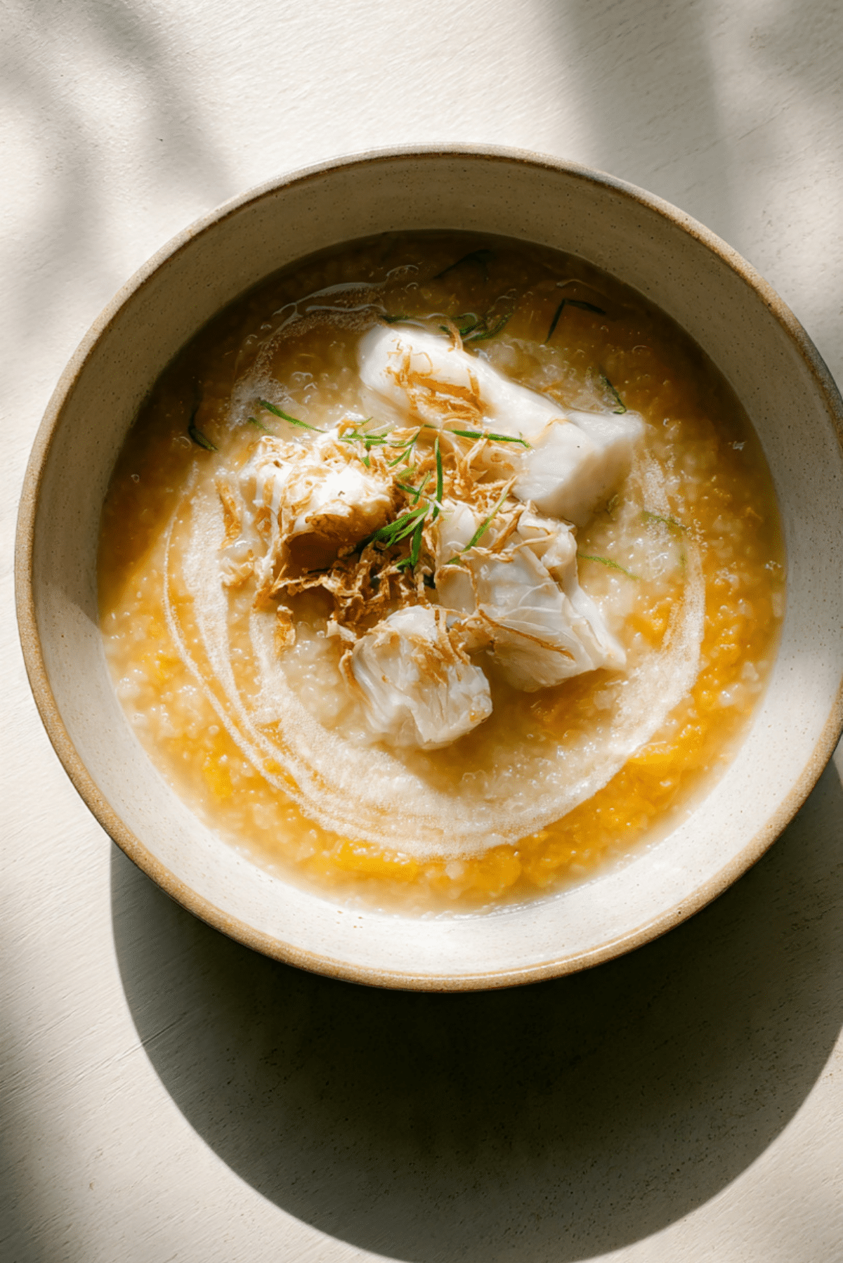 Honeynut Squash Congee with Poached Fish