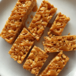 Peanut Butter Cornflake Bars with Honey Drizzle